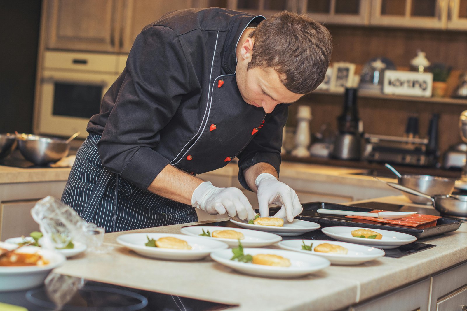 Private chef cooking in professional kitchen Cheshire